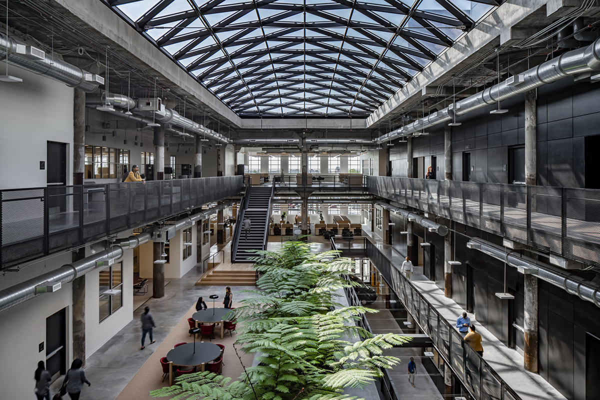 An abandoned Detroit post office was redeveloped into a book depository for the city’s public schools, illustrating  how redesigning old buildings can breathe new life into urban cores struggling with identity crises and concerns about safety. Photo courtesy of Gensler