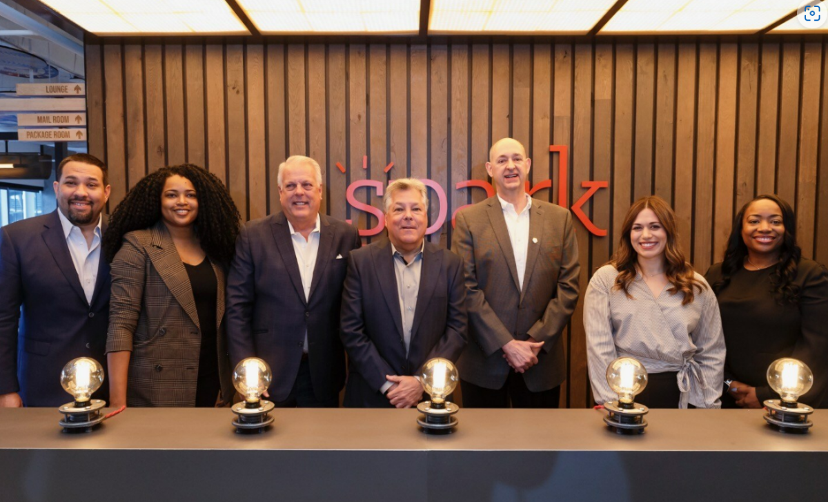 Members of the team behind Spark Arlington, along with city representatives, at the opening ceremony.