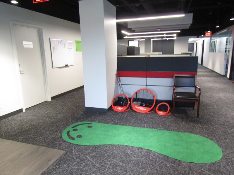 Indoor putting green at Mosaic Construction’s office in in Northbrook, Ill. 