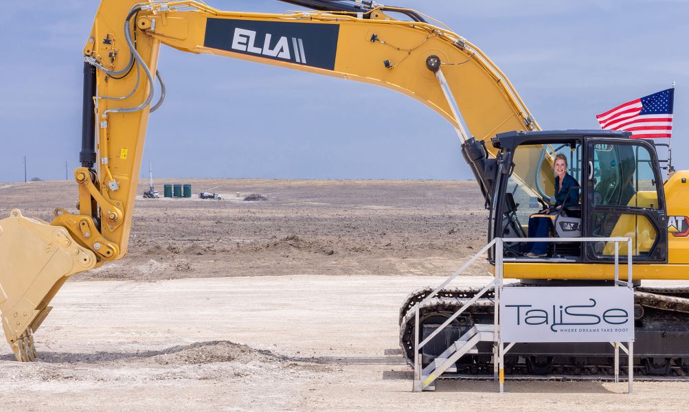 Kandy Walker, president of SE Legacy Development LLC, in an excavator at the groundbreaking of Talise, a $7.4 billion master-planned mixed-use project set for 13,000 acres of land in Laredo, Texas