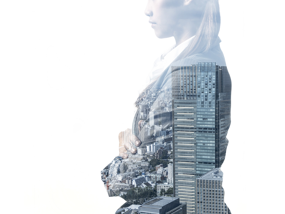 double exposure of business woman and modern building