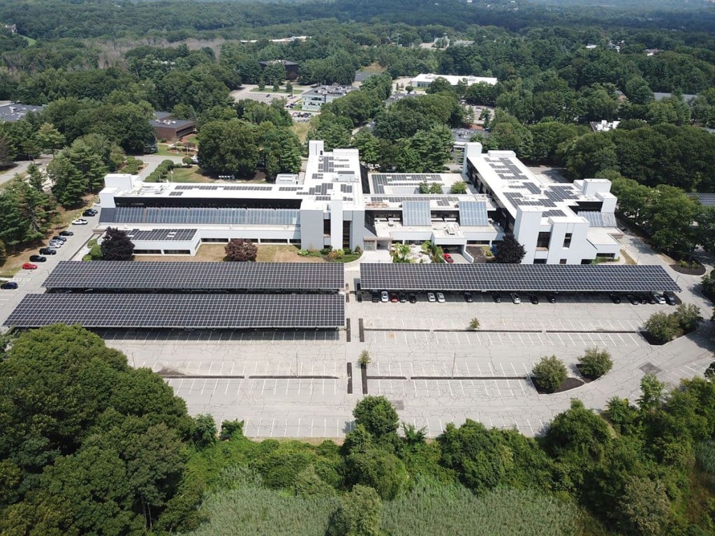 A solar setup at Wells Park, a three-building office campus. Taurus installed rooftop solar panels and retrofitted boilers with heat pumps. 