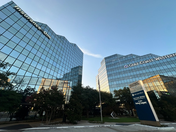 Exterior shot of the two office buildings comprising Parkway Office Center in Dallas