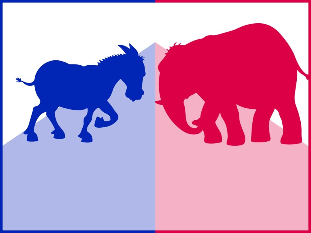 Vector illustration of a red republican elephant and a blue democratic donkey facing off. Concept for US politics, elections, election debates, american culture, confrontation and presidential election.