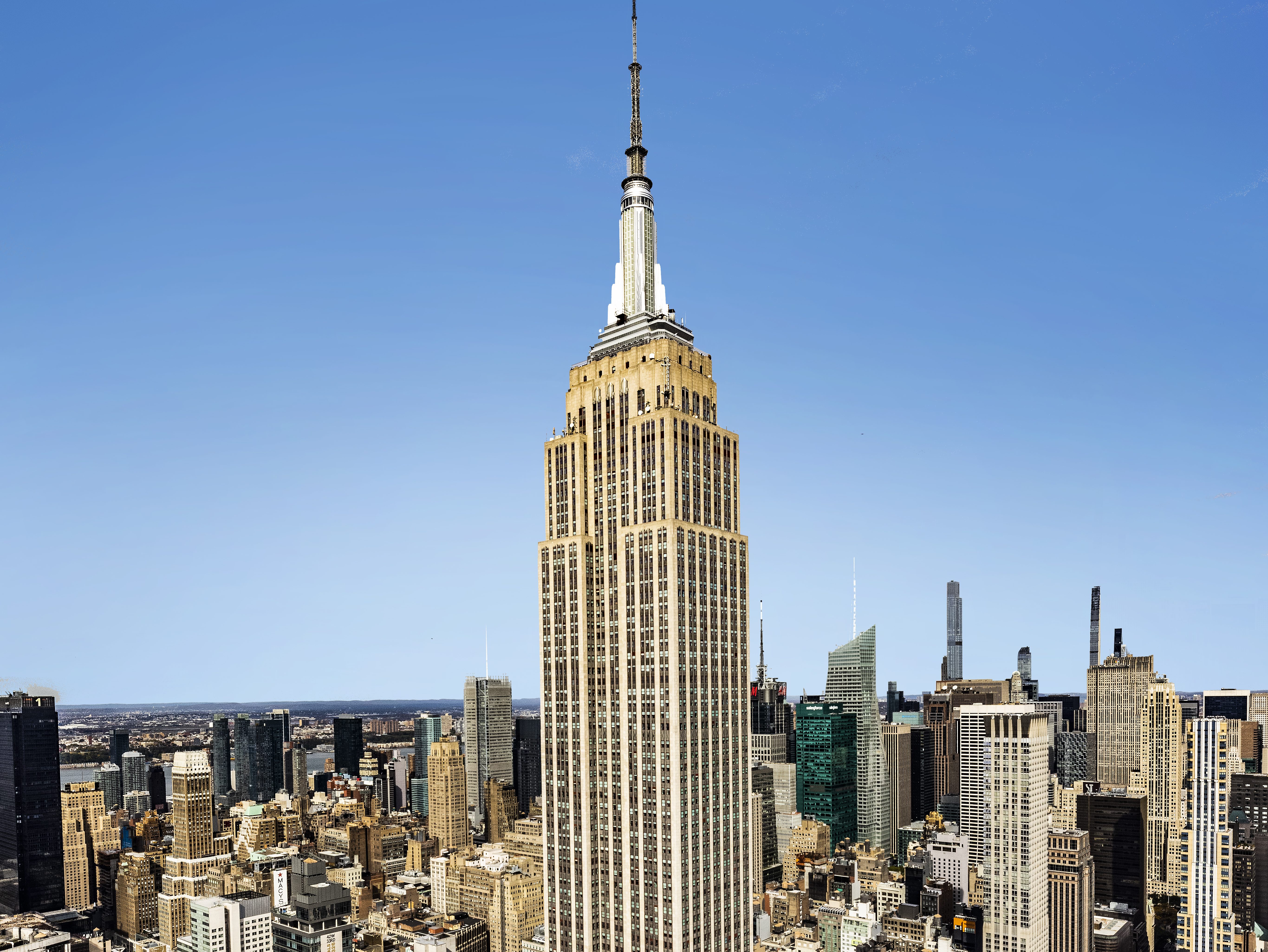 Empire State Building is originally built in 1931 and rises 102 stories.