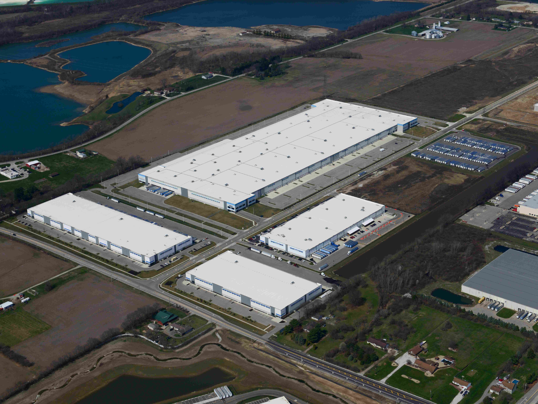 Aerial shot of the four buildings comprising the first phase of The Hub at London Groveport, an industrial park in Lockbourne, Ohio.