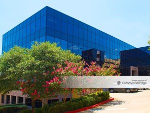 Exterior shot of one of the five buildings making up Bridgepoint Square, an office campus in Austin, Texas.