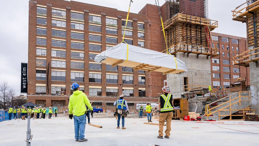 Construction of 619 Ponce, a 100,000-square-foot office building in Atlanta. The wood for the project was sourced from forests in Georgia that are owned by Jamestown, and was manufactured into the cross laminated panels in Dothan, Ala. Photos courtesy of Jamestown.