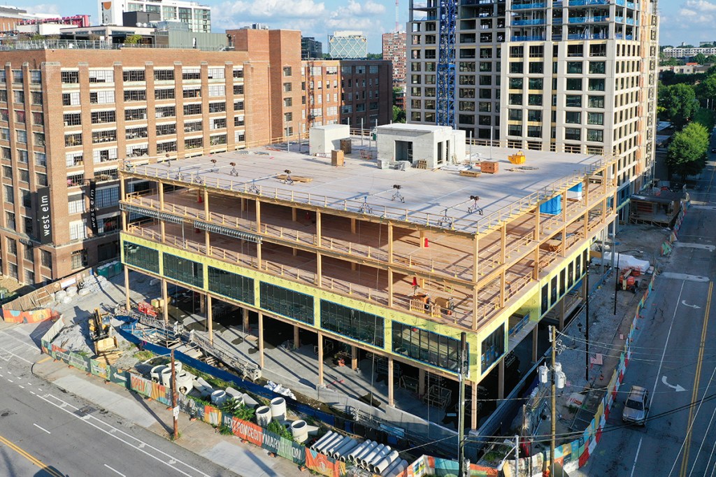 Construction of 619 Ponce, a 100,000-square-foot office building in Atlanta. The wood for the project was sourced from forests in Georgia that are owned by Jamestown, and was manufactured into the cross laminated panels in Dothan, Ala. Photos courtesy of Jamestown.