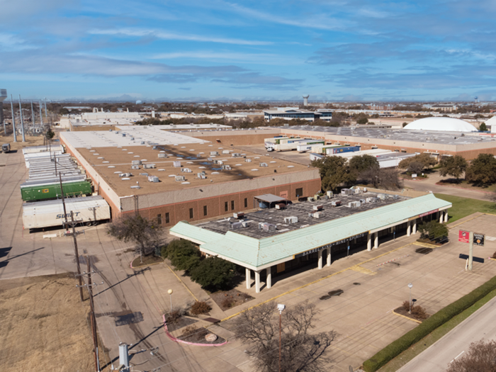 Exterior shot of the industrial building at 14261 Inwood Road in Addison, Texas.