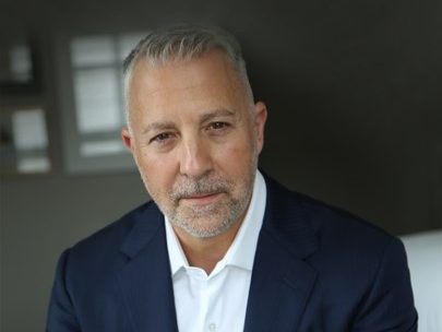 Headshot of Ben Reinberg, Founder & CEO of Alliance Consolidated Group of Cos.