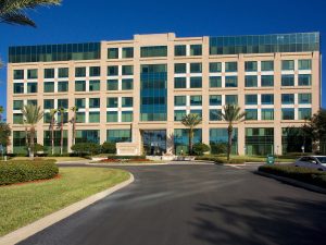 Exterior shot of Harborview Plaza, a seven-story, 205,049-square-foot mid-rise office building in Tampa, Fla.