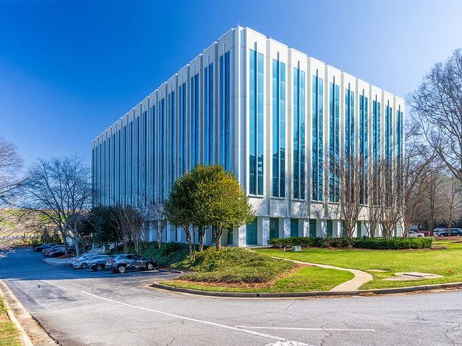 Exterior shot of Glenridge Point, a two-building, 184,912-square-foot office complex in Sandy Springs, Ga.