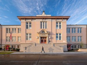 Exterior shot of the 20,000-square-foot schoolhouse in Gretna, La., recently repurposed into a coworking space.