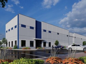 Exterior rendering of one of the buildings within Falcon Commerce Center. The industrial facility has white and blue façade and rises one story.