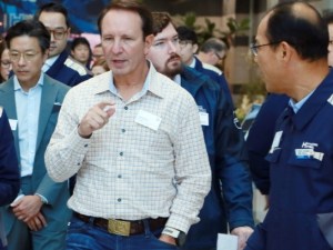 A picture with Louisiana Governor Jeff Landry at yesterday’s announcement about the Hyundai deal. The governor is wearing a checked shirt and is surrounded by Hyundai officials.